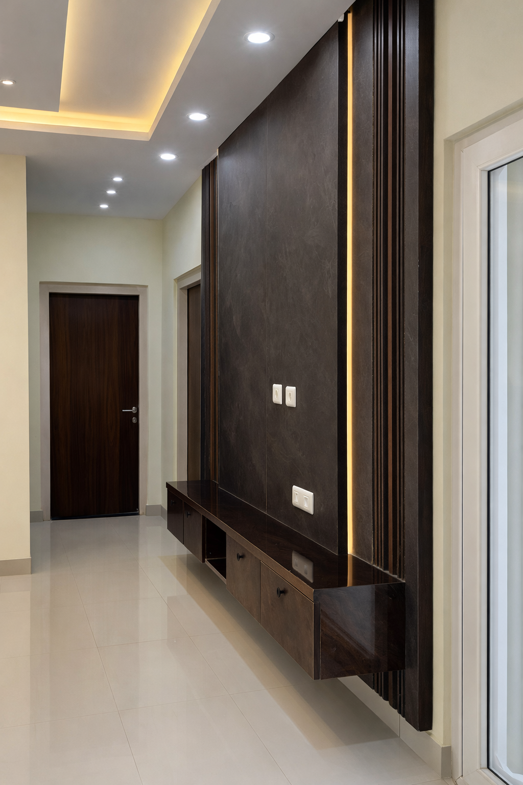 Towering Walnut Media Wall — TV Unit interior design Ramya Residence, Bangalore